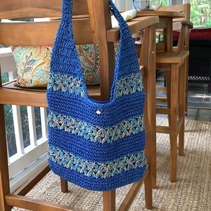 Cappelli crocheted straw bag, 16”x 12”. Fully lined, zipper opening at top.